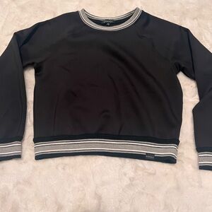 Almost new Koral sweatshirt. Hits at the waist.